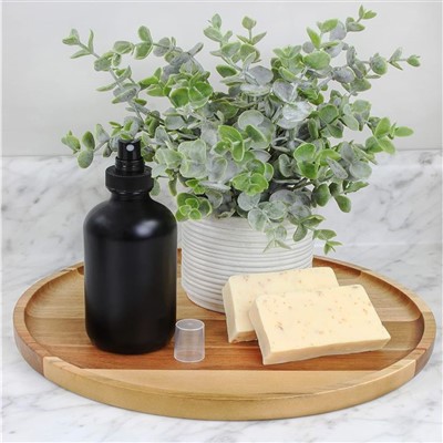 Chai nước hoa tròn màu đen